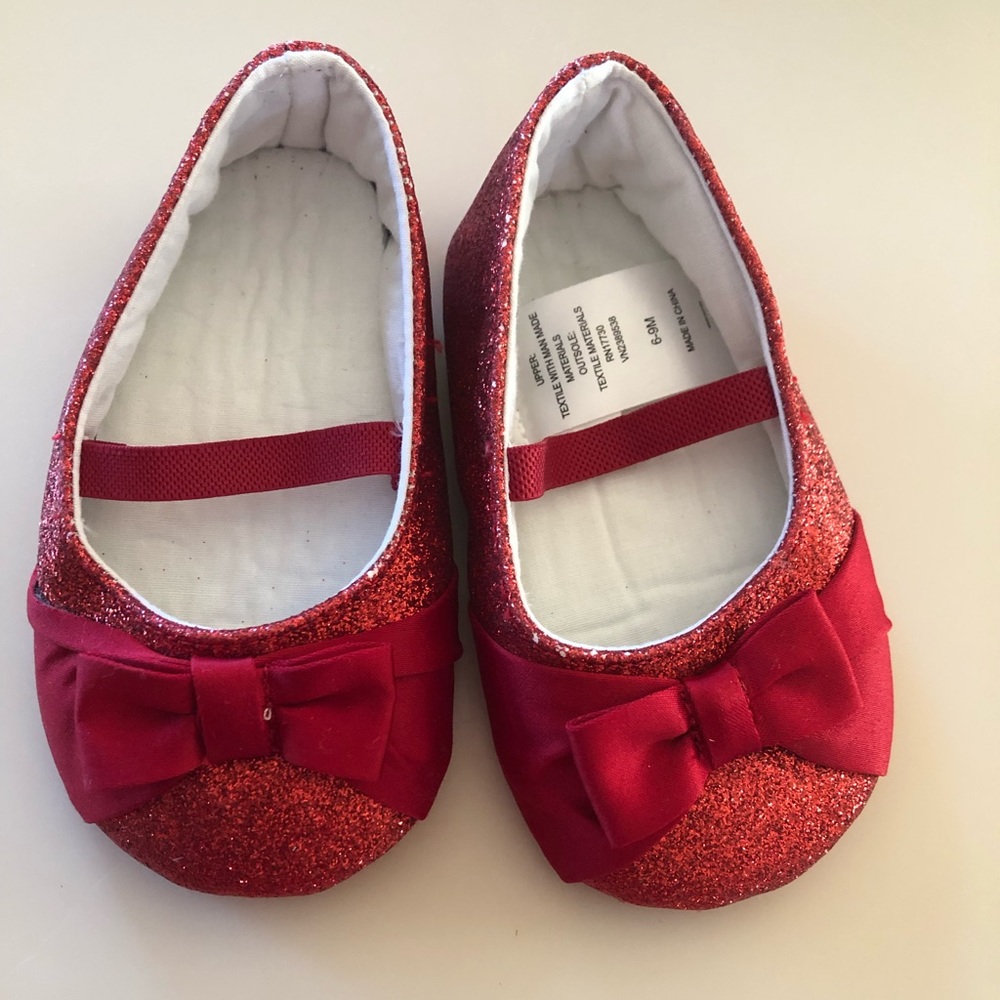 Beautiful baby girl red sparkly shoes